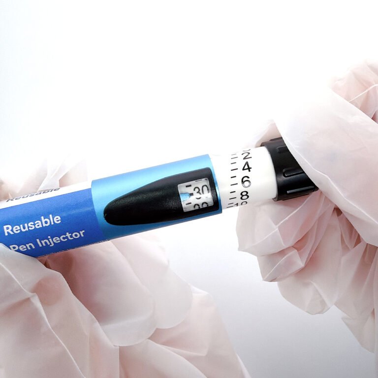 Reusable pen injectors
